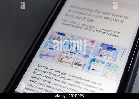 A blog post “Announcing the next wave of AI innovation with Microsoft Bing and Edge” from Microsoft Blog website seen in an iPhone. Stock Photo