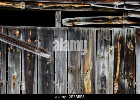 Warped boards on an old barn Stock Photo