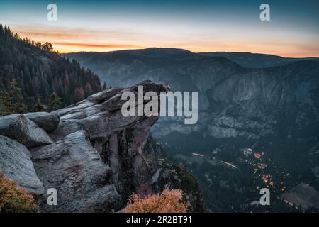 Overhanging Rock at Glacier Point in Yosemite National Park, California, USA at twilight. Stock Photo