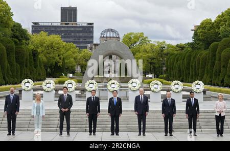 May 19, 2023, Hiroshima, Japan: (L-R) European Council President Charles Michel, Italian Prime Minister Giorgia Meloni, Canadian Prime Minister Justin Trudeau, French President Emmanuel Macron, Japan's Prime Minister Fumio Kishida, US President Joe Biden, German Chancellor Olaf Scholz, British Prime Minister Rishi Sunak, European Commission President Ursula von der Leyen pose for a group photo after laying flower wreaths at the Cenotaph for Atomic Bomb Victims in the Peace Memorial Park as part of the G7 Hiroshima Summit in Hiroshima, Japan, 19 May 2023. (Photo by Franck Robichon/Pool) The G Stock Photo
