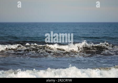Breaking waves in Mediterranean sea on Mallorca coastline Stock Photo