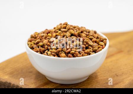 Sumac seeds. Dried sumac berries isolated on white background. Spice concept Stock Photo