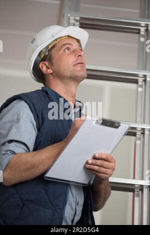construction expert checking a new construction Stock Photo