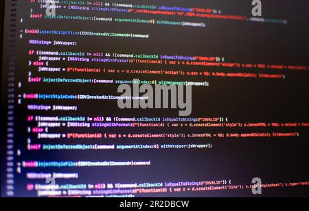 Programming source code Programmers coding apps for use with Internet business services. The programming code displayed on the laptop computer screen. Stock Photo