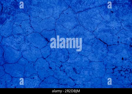 Beautiful Abstract Grunge style. Take close-up shot of concrete texture detail, blue dark cement background. The wall has a pattern repetition of scat Stock Photo