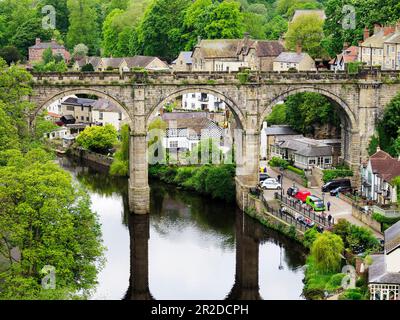 Railway viaduct crossing the River Nidd in spring Knaresborough North Yorkshire England Stock Photo