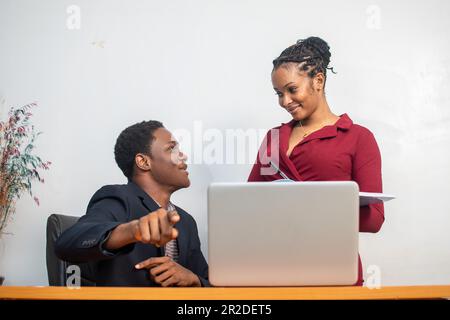 two african employees working together on a project Stock Photo