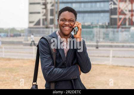 young african business man making a phone call Stock Photo