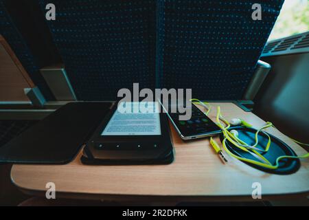 ebook reader on the table in train Stock Photo