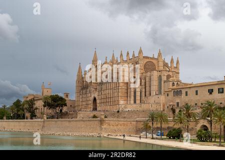 Palma, Majorca - May 13th 2023: Cathedral of Santa Maria under cloudy sky in Palma de Mallorca, Spain Stock Photo