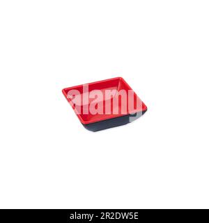 Small japanese style black and red plastic bowl isolated over white background. Stock Photo