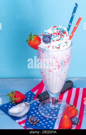 Patriotic USA American loaded milkshake, sweet dessert with red, white ...