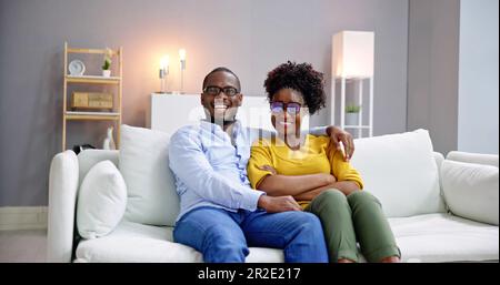 Portrait Of An Happy African Young Couple With Eyeglasses Stock Photo