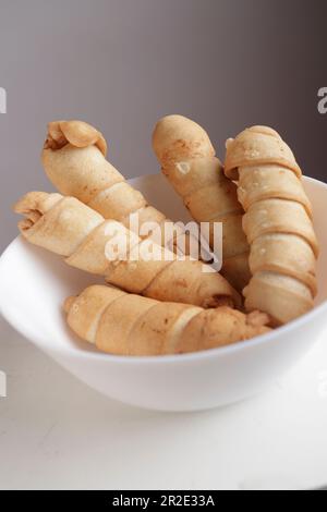 fried tequeños in porcelain dish Stock Photo