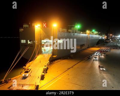 LIANYUNGANG, CHINA - MAY 19, 2023 - Ro-ro wheels load 1,700 cars for export to Mexico at Berth 58 of Lianyungang Terminal in East China's Jiangsu prov Stock Photo