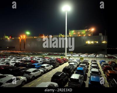 LIANYUNGANG, CHINA - MAY 19, 2023 - Ro-ro wheels load 1,700 cars for export to Mexico at Berth 58 of Lianyungang Terminal in East China's Jiangsu prov Stock Photo