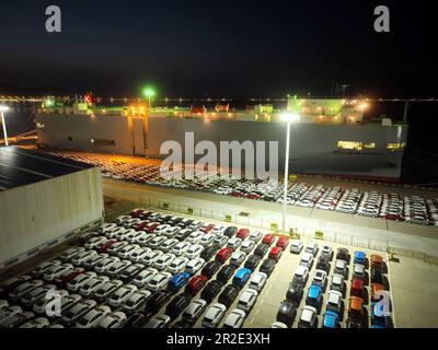 LIANYUNGANG, CHINA - MAY 19, 2023 - Ro-ro wheels load 1,700 cars for export to Mexico at Berth 58 of Lianyungang Terminal in East China's Jiangsu prov Stock Photo