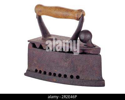 An old rusty charcoal iron on a white background Stock Photo