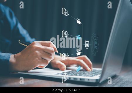 Online documentation database and process document electronic automation platform, IT staff working with Document Management System, DMS, Corporate bu Stock Photo