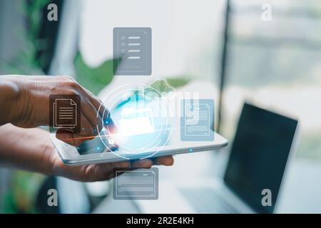 Concept of online document management technology. Businesspeople manage corporate databases through cloud, cyberspace technology and large, paperless Stock Photo