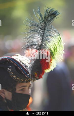 Bamburet, KPK,Pakistan - 05152023: A feather on the headgear of a Kalash woman at the Chilam Joshi Festival Stock Photo