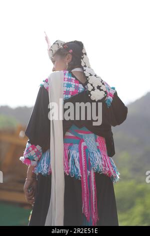 Traditional Clothing of a Kalash woman in Chitral at the Chilam Joshi Festival Stock Photo