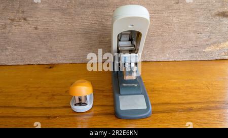 A Large and a Small Office Stapler Stock Photo
