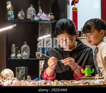 Traditional 'inside' Bottle Painting in a traditional Hutong home, Beijing Stock Photo
