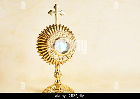 Ostensory for worship for Catholic church ceremony. Corpus christi. Stock Photo