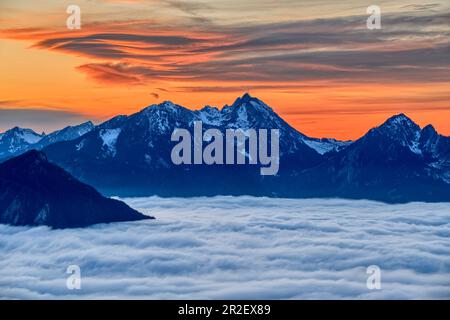 Cloudy mood at sunset over Wendelstein and sea of fog in the Inn Valley, Heuberg, Chiemgau Alps, Chiemgau, Upper Bavaria, Bavaria, Germany Stock Photo