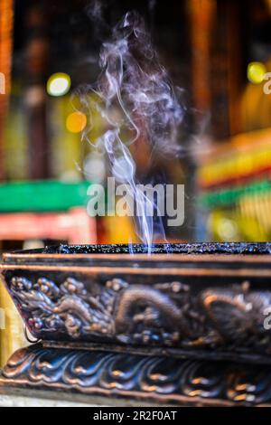 Monastery incense smokes in an ornate bronze pot at Gandan Monastery, Ulaanbaatar, Mongolia, Asia Stock Photo