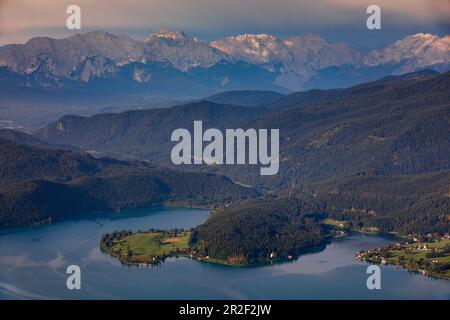 Walchensee with peninsular dwarfs and mountain backdrop in the morning sun from above, Bavaria Stock Photo