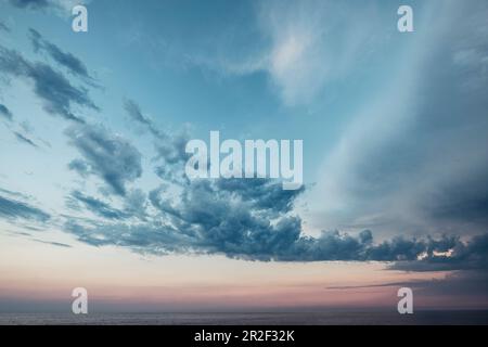 Clouds over the sea between Corsica, France, and Livorno, Italy. Stock Photo
