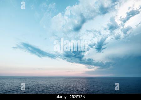 Clouds over the sea between Corsica, France, and Livorno, Italy. Stock Photo