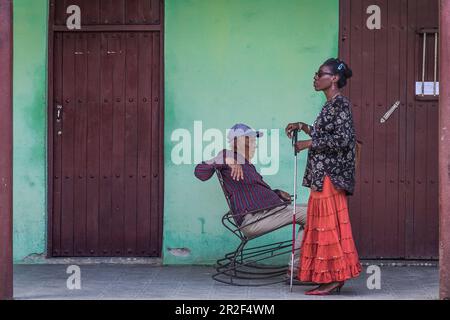 Blind Cuban woman with elderly man enjoy a stress-free afternoon in Ciego de Avila, Cuba Stock Photo