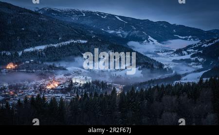 Beautiful view of the snow-covered Murau and the Kreischberg ski area in the background, Murau, Austria Stock Photo