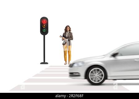 Car waiting at pedestrian crossing and teacher with stop sign and ...