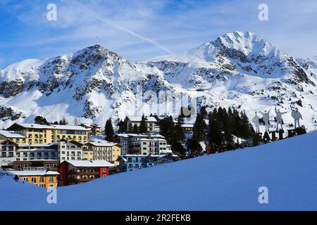 View of Obertauern, ski resort, pass, mountains, snow, skis, lights, winter in Salzburg, Austria Stock Photo