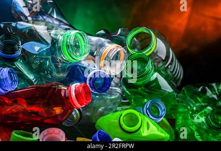 Empty colored drink bottles. Recyclable plastic waste Stock Photo