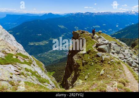 Mountain hiking in the South Tyrolean Texel Group Nature Park, descent from the Hochgangscharte 2400 m above sea level, with a view of the Vinschgau. Stock Photo