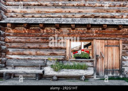 Old wooden hut on the Alpe di Siusi in the Dolomites, South Triol, Italy. Stock Photo