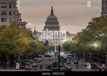 Captivating View of Capitol Hill: Iconic United States Capitol Building amidst the bustling cityscape of Washington, D.C. Stock Photo