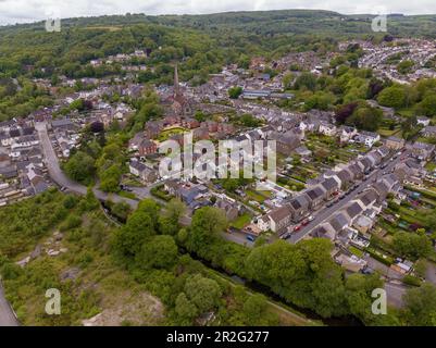 Editorial SWANSEA, UK - May 14, 2023: Drone view of Pontardawe town in the Swansea Valley featuring St Peter's Church. Stock Photo