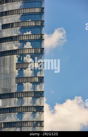 Detail of an office building and sky with clouds Stock Photo - Alamy