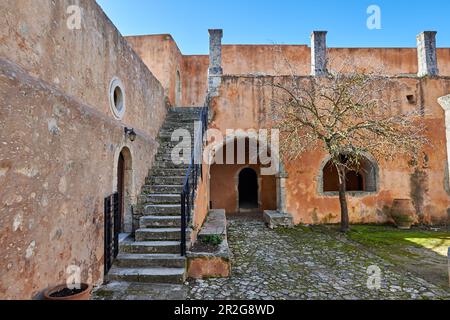 View of the inner courtyard of the Architecturally remarkable, historic 16th century Arkadi Orthodox Monastery and Church with Masses, Arkadi, Crete, Stock Photo