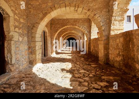View of the inner courtyard of the Architecturally remarkable, historic 16th century Arkadi Orthodox Monastery and Church with Masses, Arkadi, Crete, Stock Photo