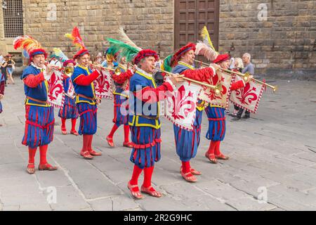 Participants in Calcio Storico Fiorentino festival on parade, Piazza della Signoria, Florence, Tuscany, Italy Stock Photo