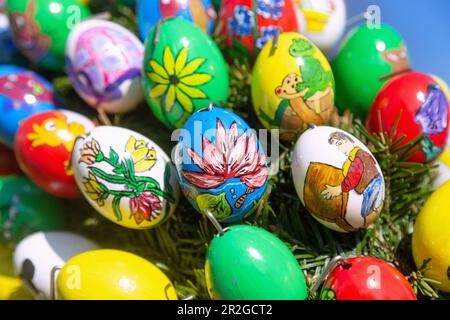 Easter fountain decorated with 2900 real painted Easter eggs in Teuchatz in Franconian Switzerland, Bavaria, Germany Stock Photo