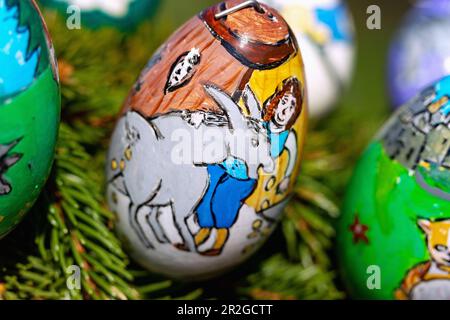 Painted Easter eggs, Easter fountain decorated with colorful Easter eggs on the Leinleiter in Zoggendorf in Franconian Switzerland, Bavaria, Germany Stock Photo