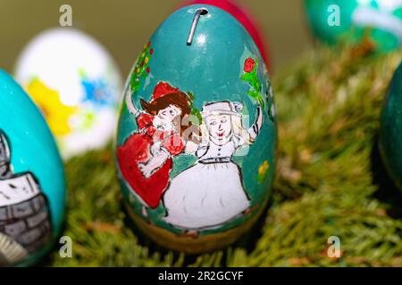 Painted Easter eggs, Easter fountain decorated with colorful Easter eggs on the Leinleiter in Zoggendorf in Franconian Switzerland, Bavaria, Germany Stock Photo
